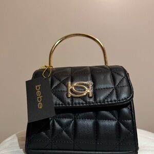 Bebe crossbody bag , brand new with tags, color black